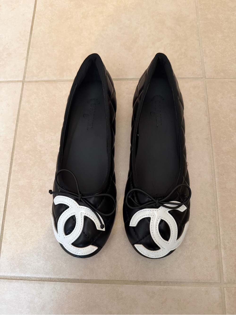 Black Quilted Ballet Flats with White Interlocking Accent
